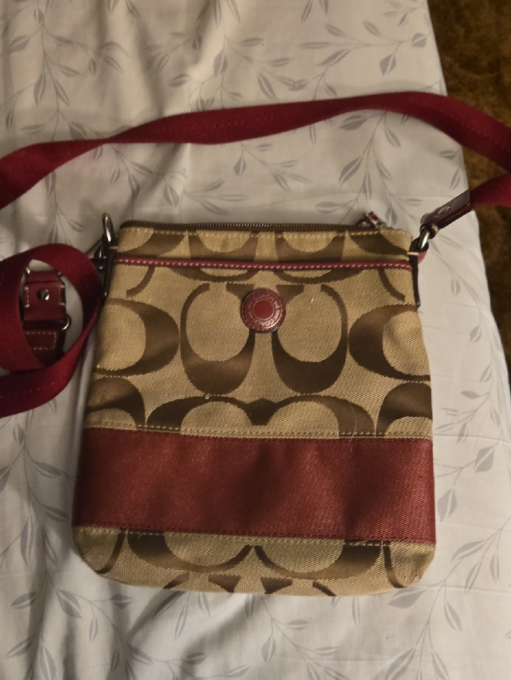 Coach Brown Signature Canvas Crossbody with Red Strap